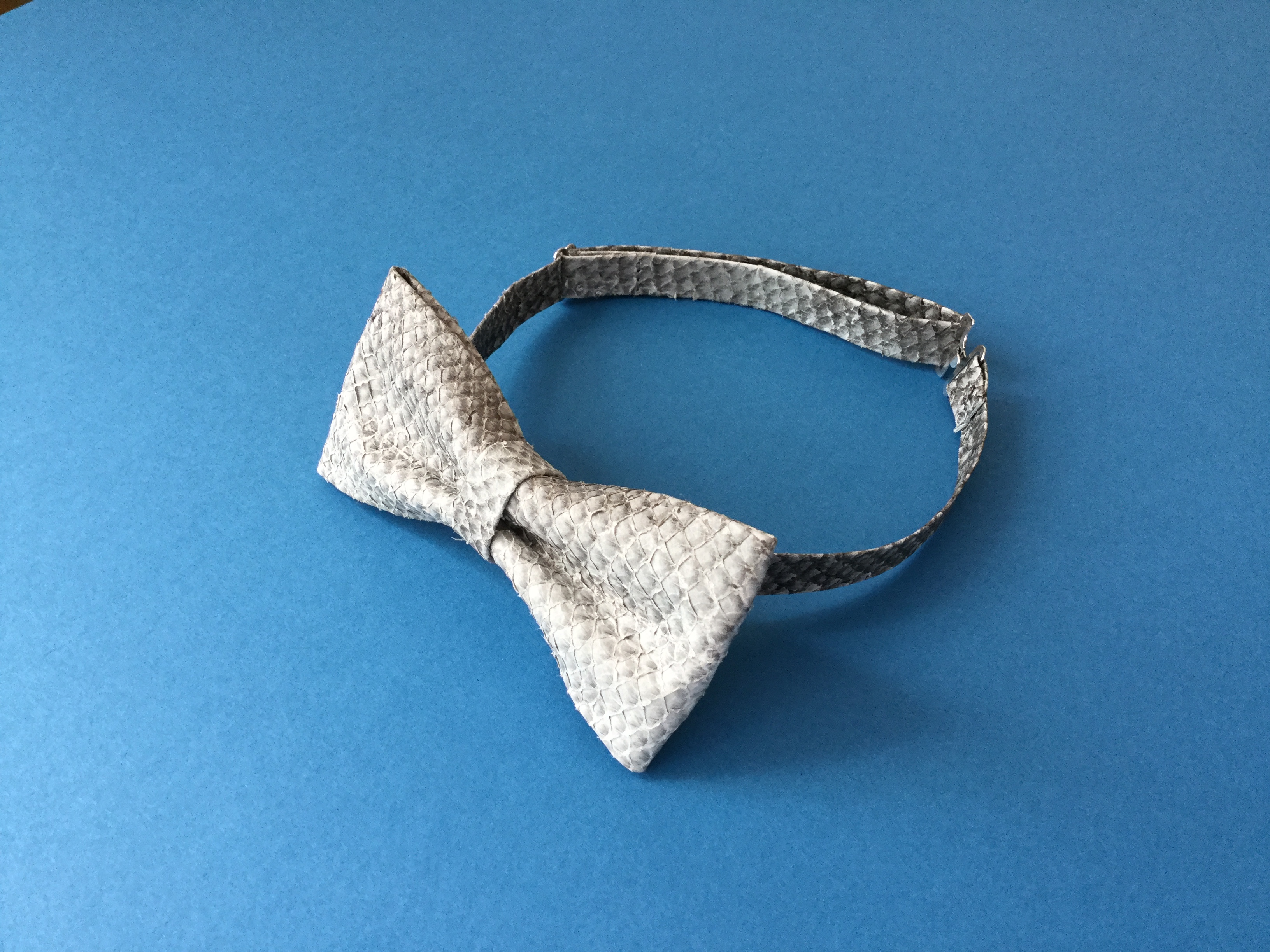 A bow tie from salmon leather